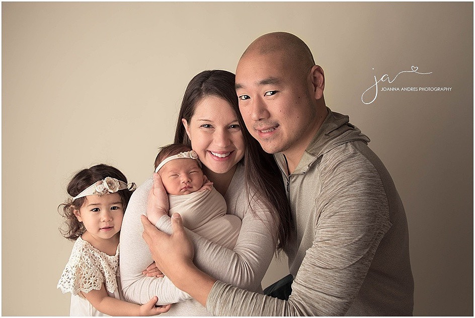 Newborn with Family Pose