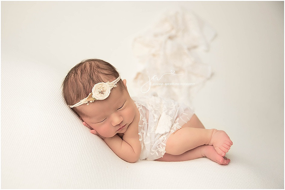 Newborn Girl Side Laying Pose with Lace