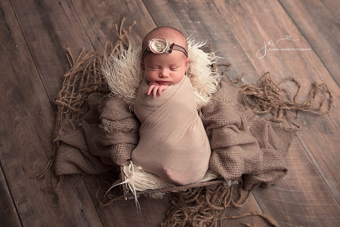 Baby Wrapped in Neutrals