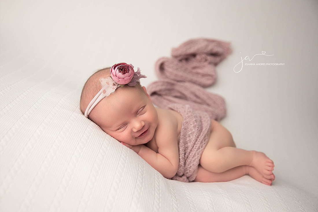 Baby Girl Side Laying Pose Smiling