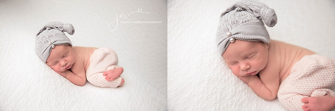 Newborn Baby Girl in Gray hat and pink pants