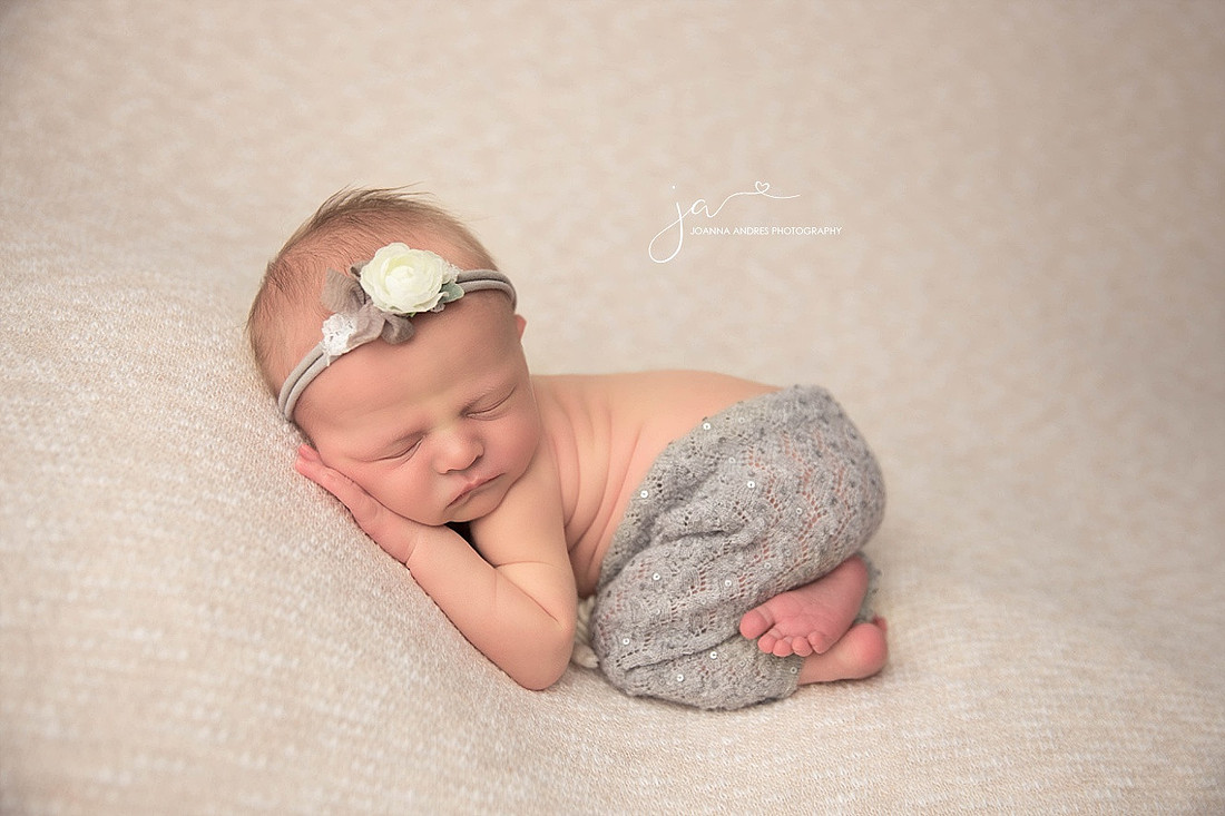 Newborn Baby Girl in Grays