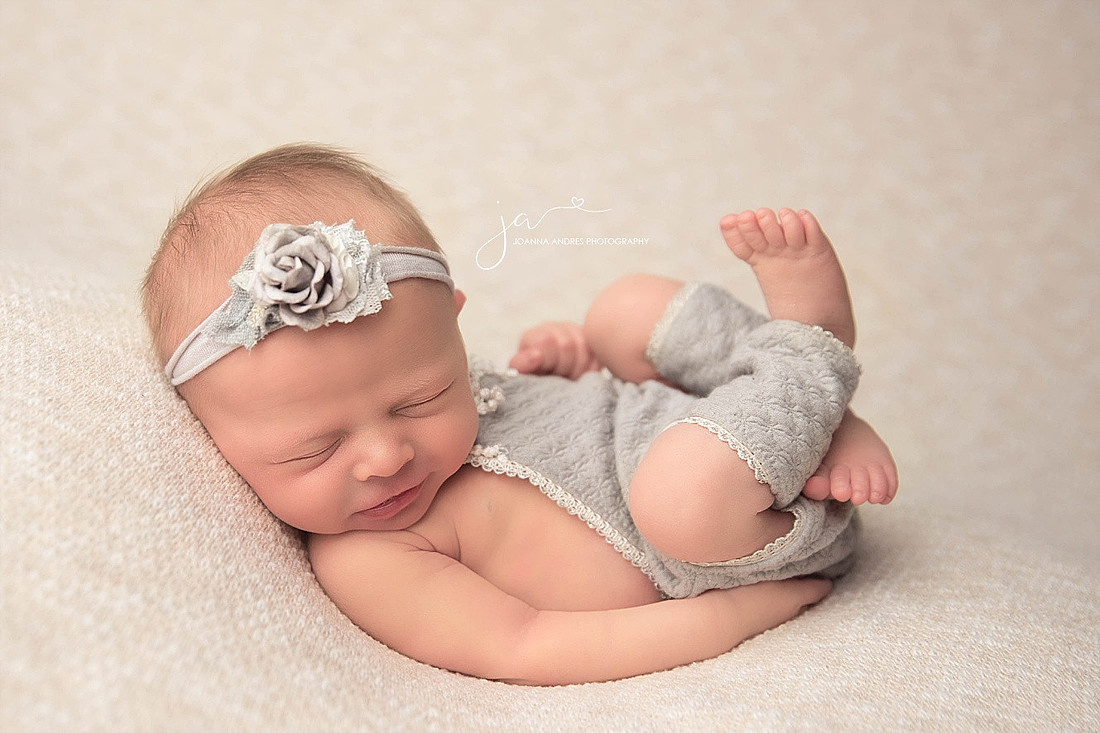 Baby Girl Smiling in Grays