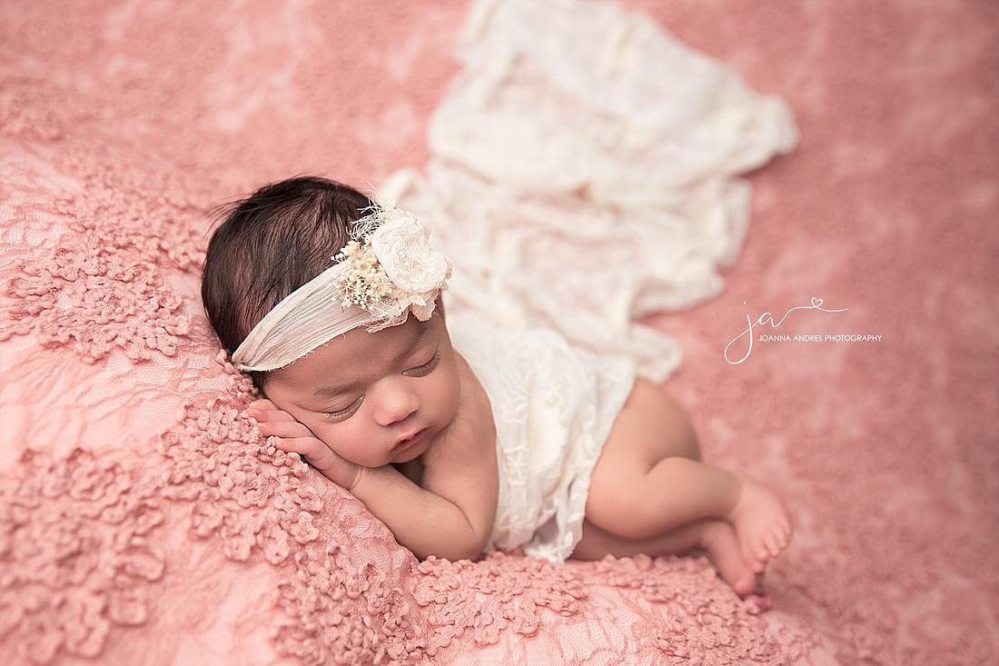 Baby Girl Side Laying Pose in Pinks and Creams