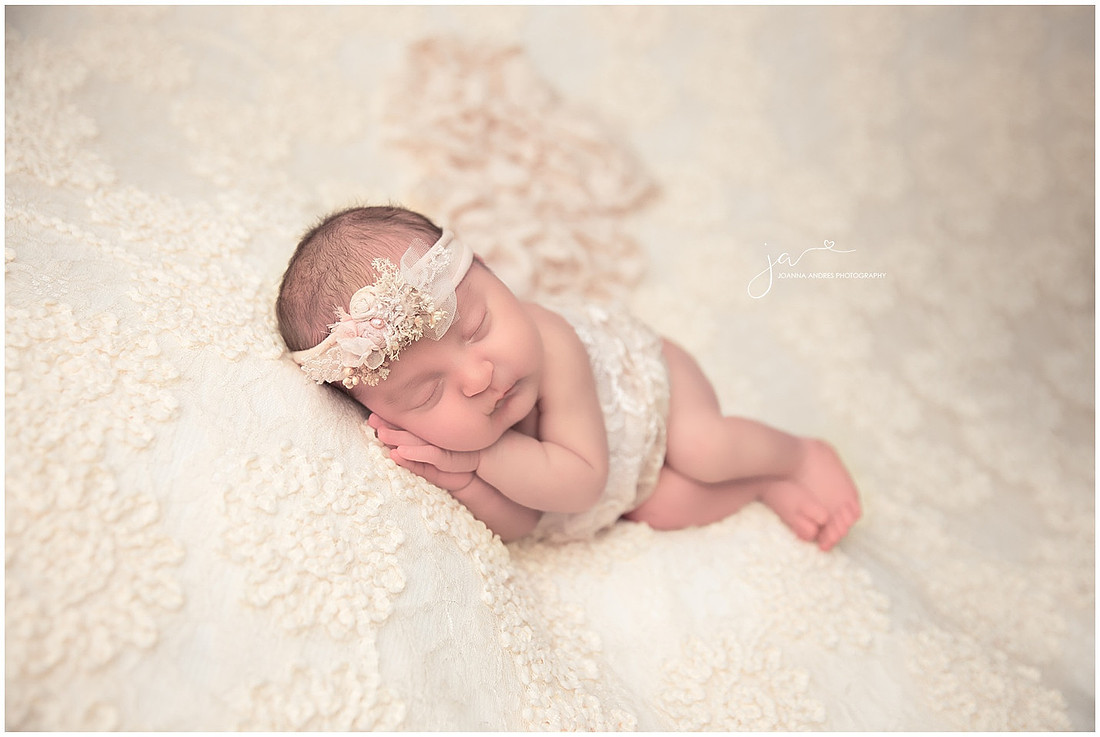 Newborn Girl in Creams SIde Laying Pose