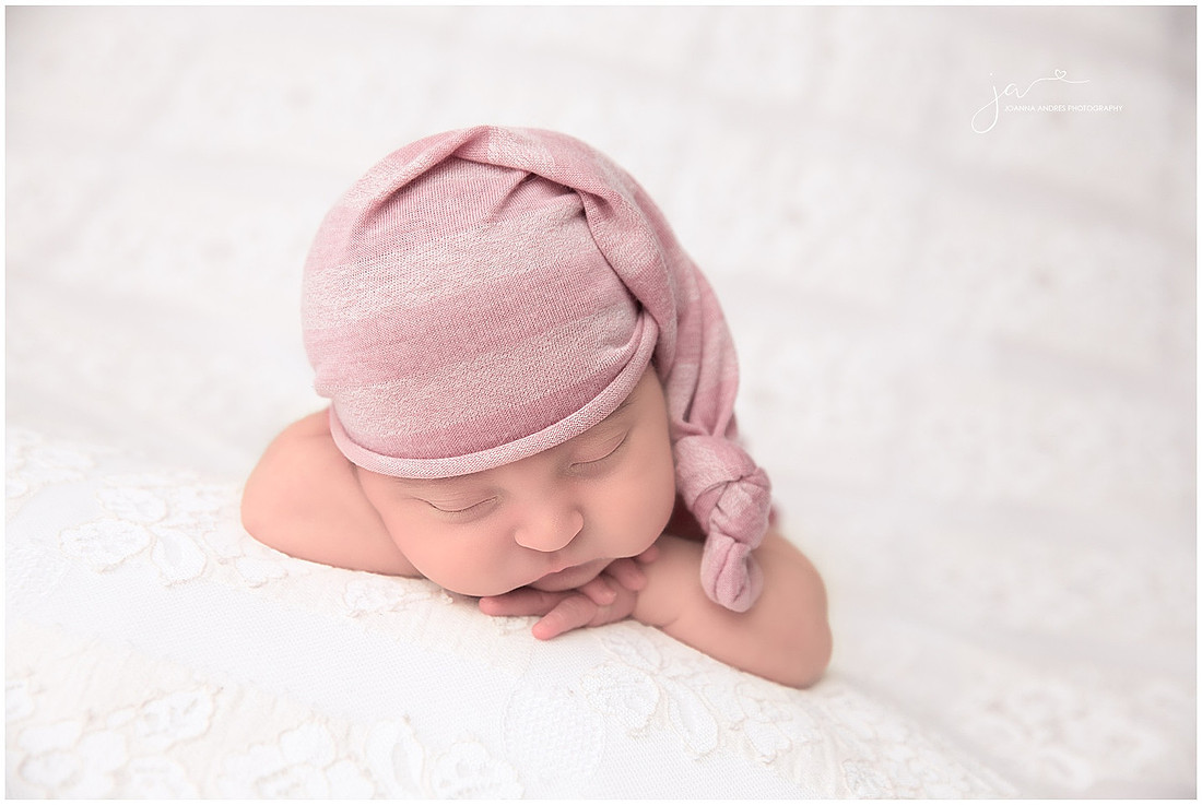 Newborn Baby Girl Hands Over Head Pose
