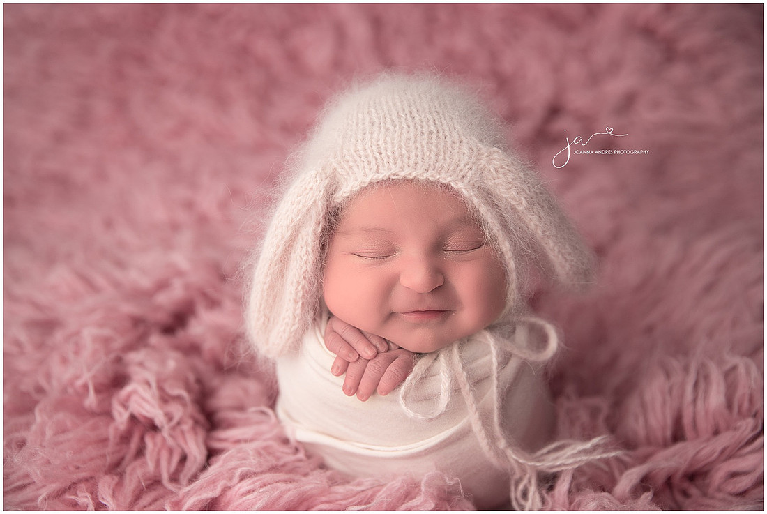 Baby Girl in Pink and Creams wrapped and smiling big