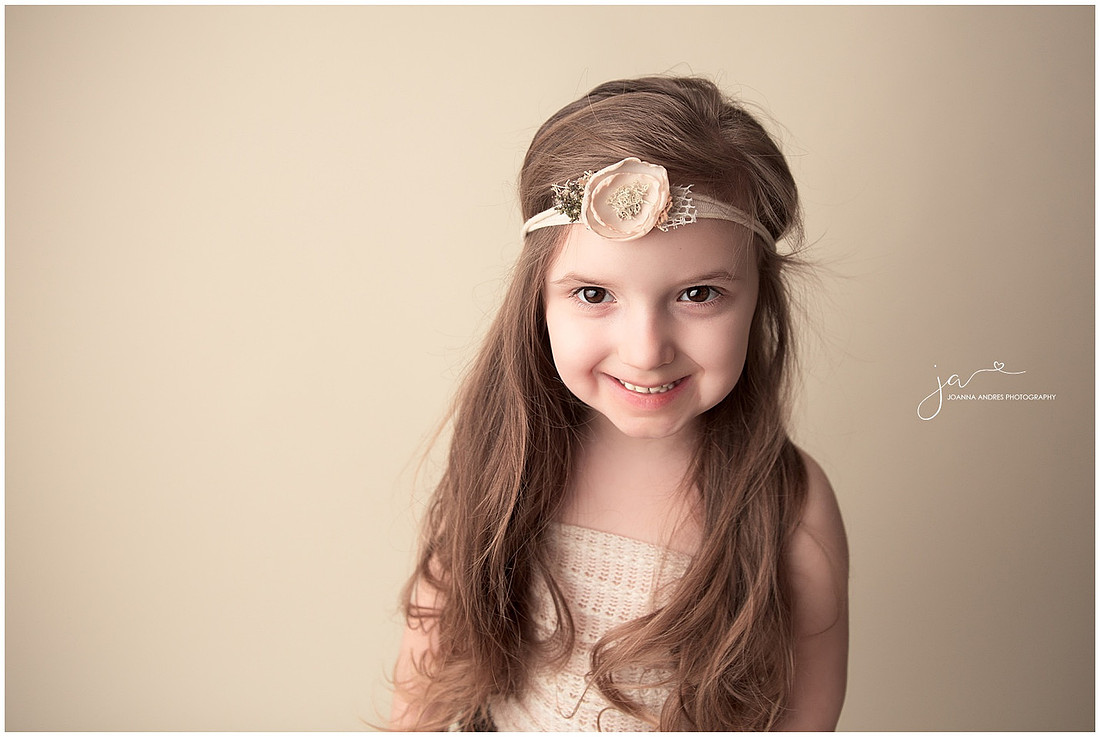 Sweet Little GIrl with long gorgeous hair in creams