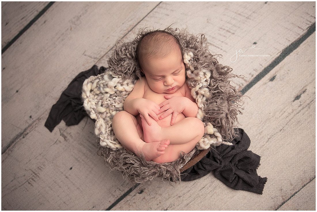 Newborn Baby Boy in Prop