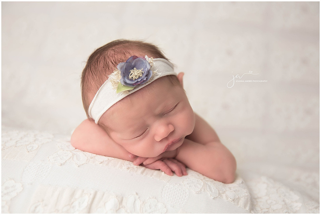 Baby Girl head on hands pose