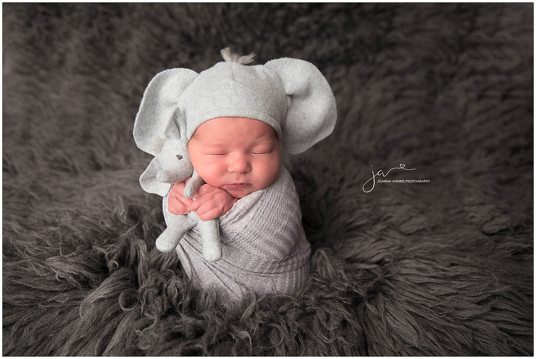 Baby in Potato Sack Pose with Elephant Ears and Lovey