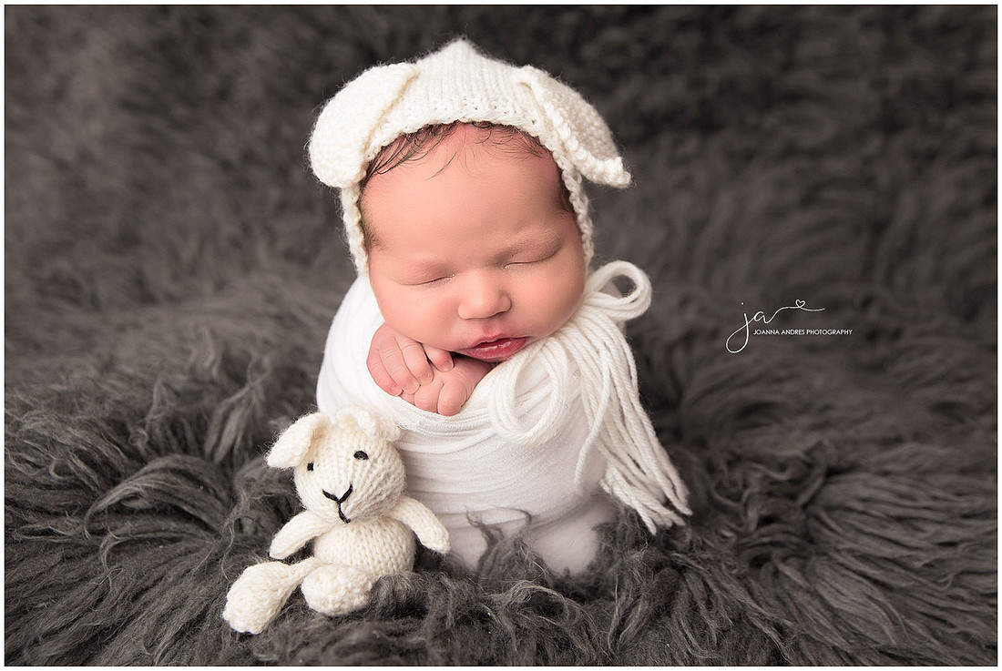 Newborn Baby Boy wrapped in whites