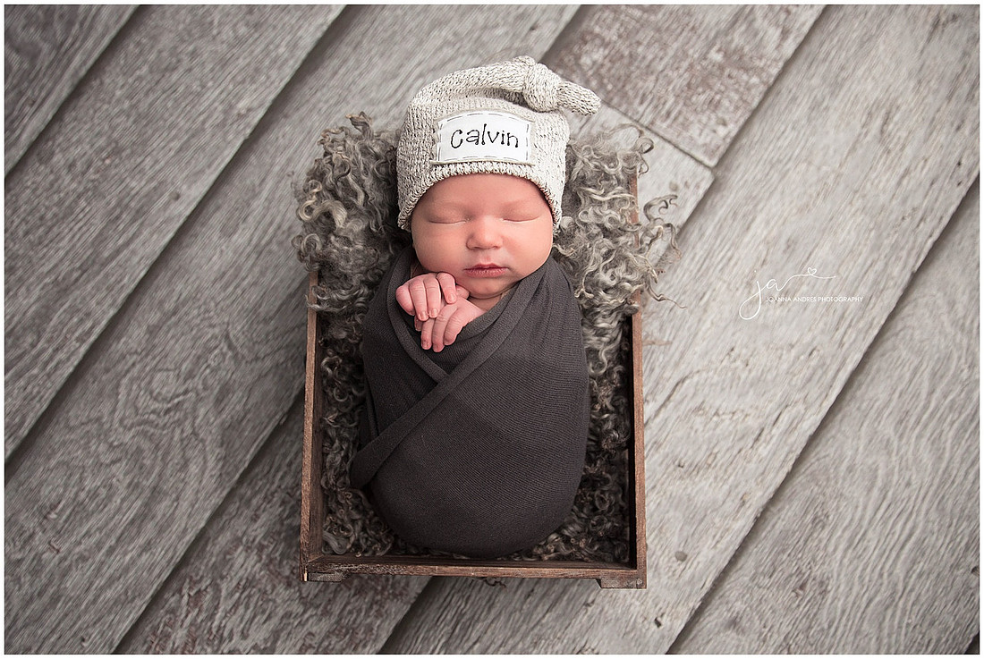 Newborn Baby Boy in Basket with Hat