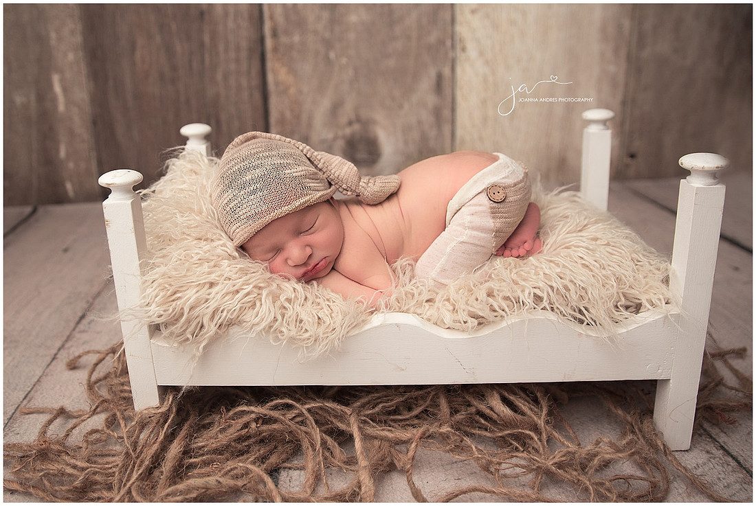 Baby Boy in a white bed