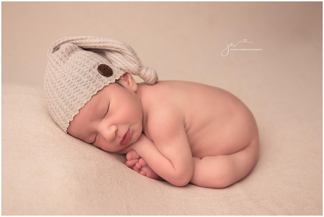 Baby Boy in a taco pose with neutral hat