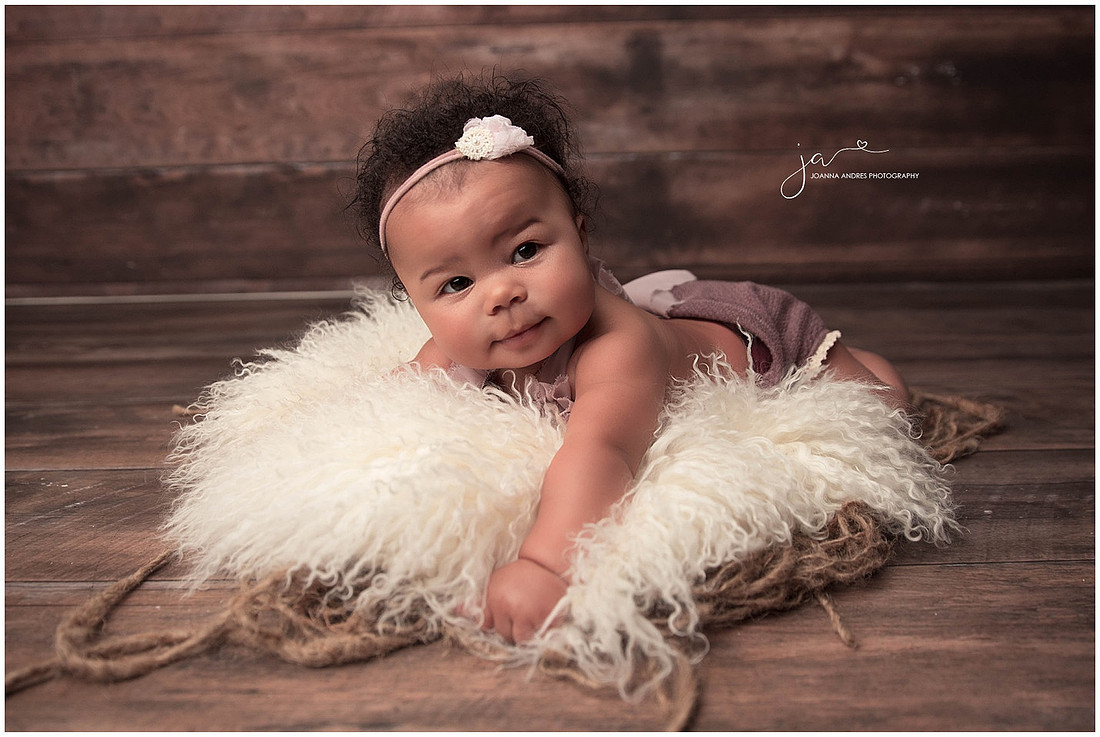 Baby Raelynn laying on her belly
