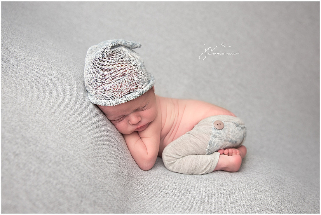 Newborn Baby Boy in Grays and Light Blues