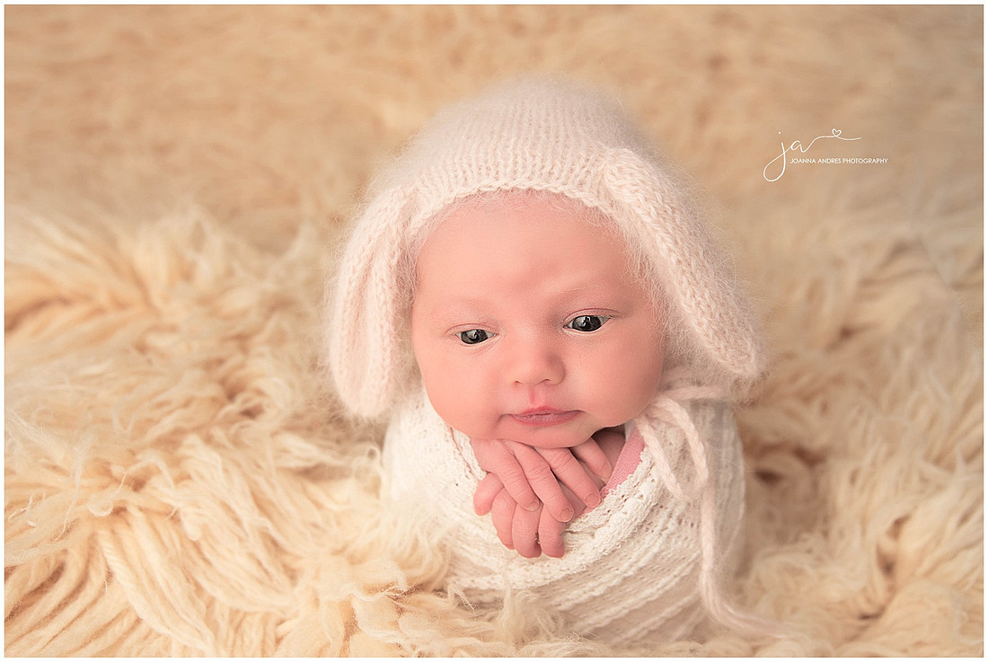 Baby Girl wrapped in Creams baby wide awake