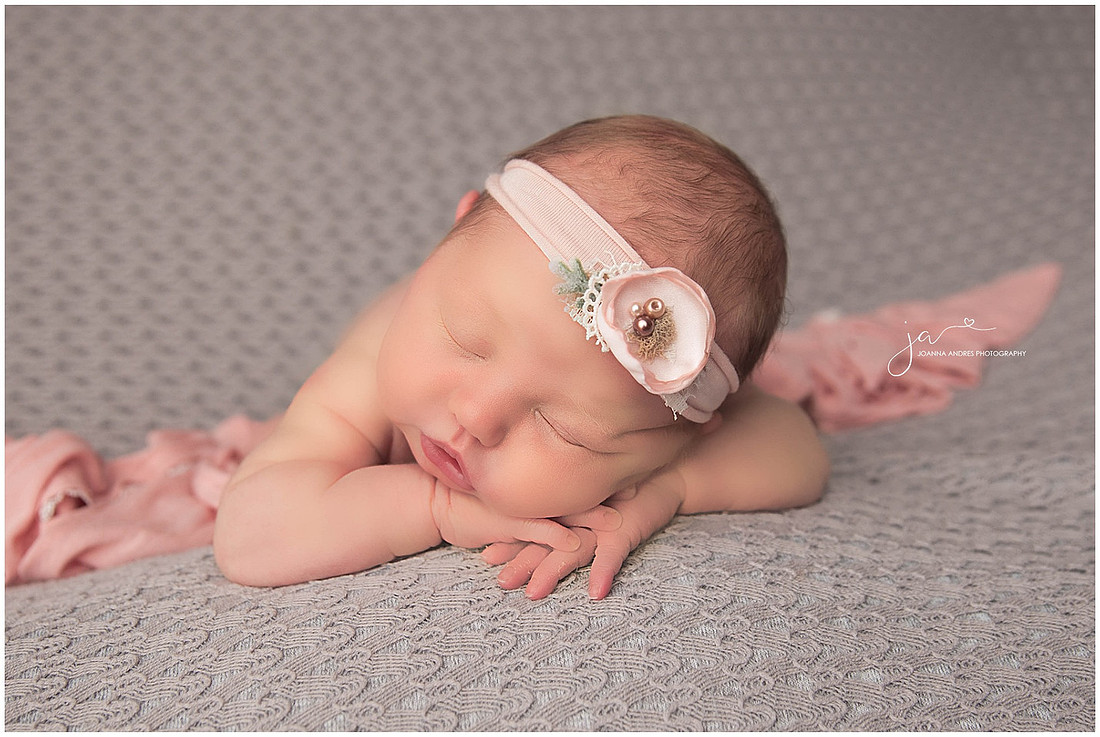 Baby Girl hands over head pose