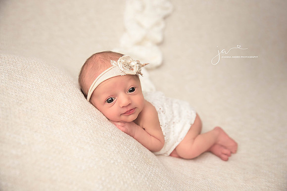 Newborn Baby Girl with eyes wide open