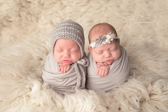 Twins posed in Gray Wrap girl with headband and boy with bonnet