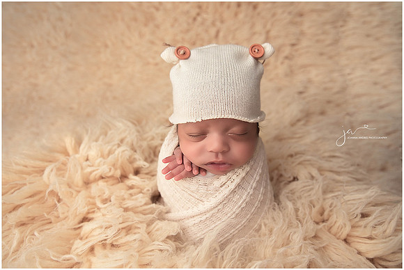 Newborn Baby Boy wrapped in Neutrals
