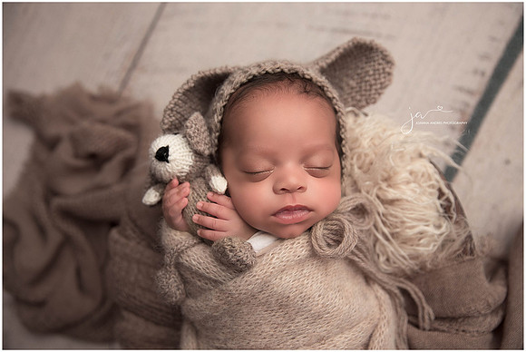 Baby in browns with puppy lovey
