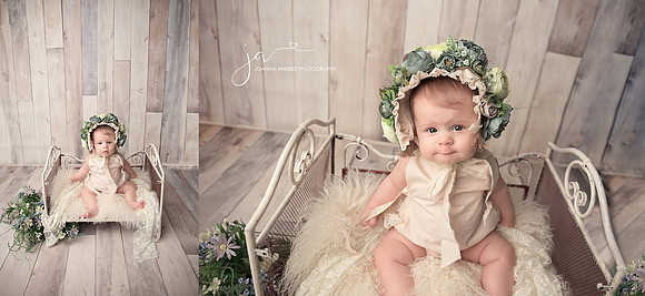 Baby Girl on Bed with Flower Bonnet