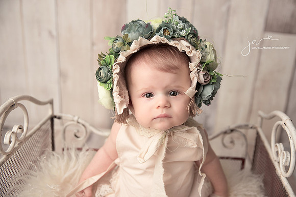 Baby Girl with Flower Bonnet