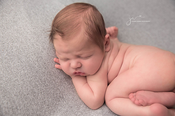 Newborn Baby Boy CLose up of Baby's Back Rolls