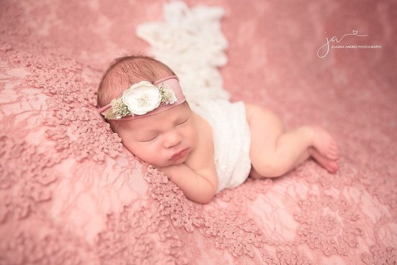 Newborn Girl Side Laying Pose with Blanket