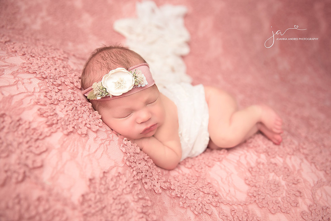Newborn Girl Side Laying Pose with Blanket