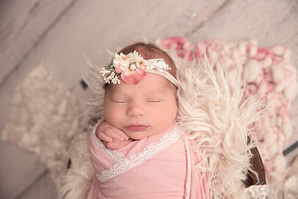 Newborn Baby Girl wrapped in Pink