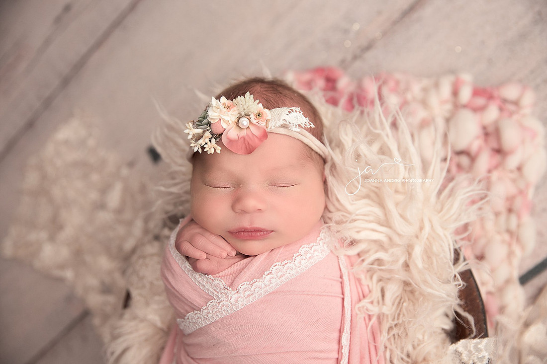 Newborn Baby Girl wrapped in Pink