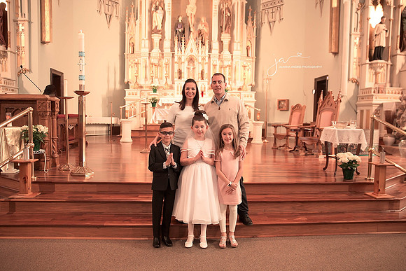 First Communion with GodParents In church