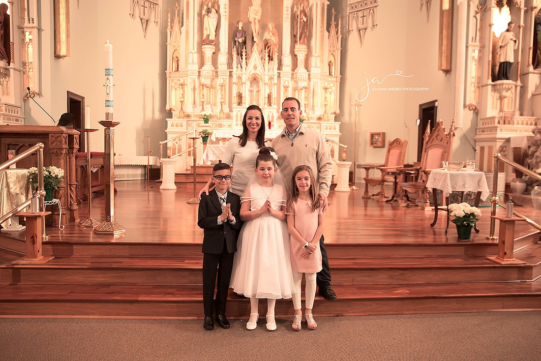 First Communion with GodParents In church