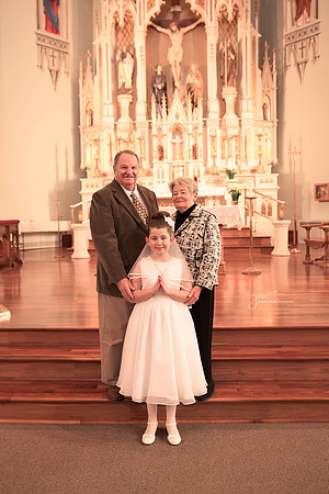 First Communion with Grandparents in church