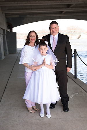 First Communion with family outdoors