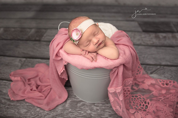 Newborn Girl in a bucket