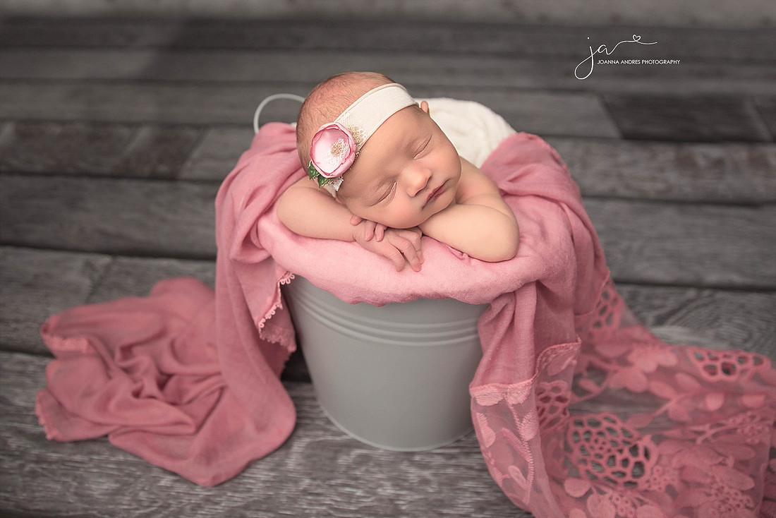 Newborn Girl in a bucket
