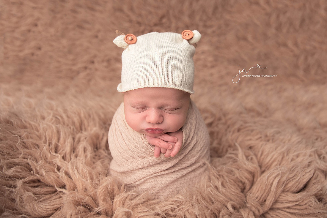 Baby Boy in Potato Sack Pose in neutrals