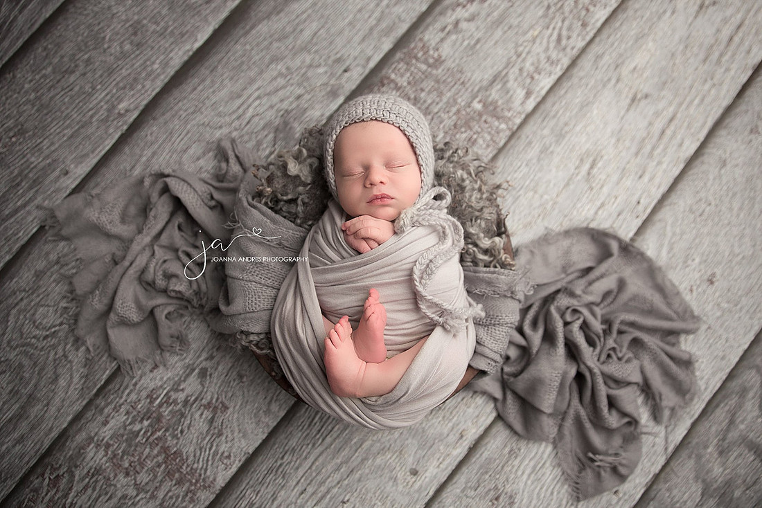 Baby Boy in prop with gray wrap