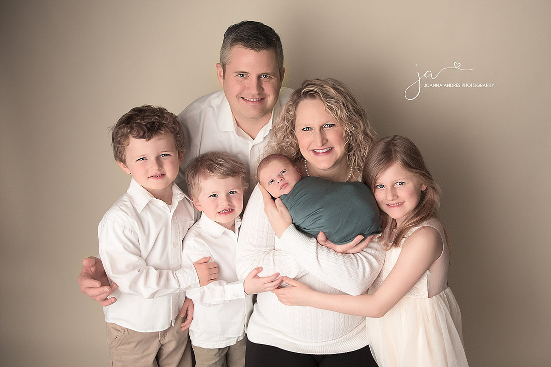 Family portrait with newborn baby boy