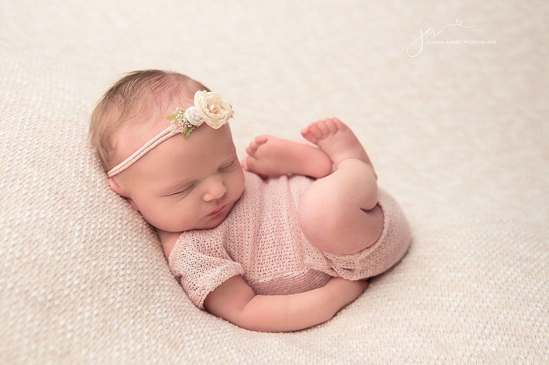 Huck Finn pose with baby girl in pink with neutral throw