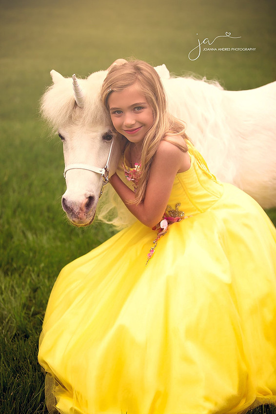 Close up of girl and unicorn