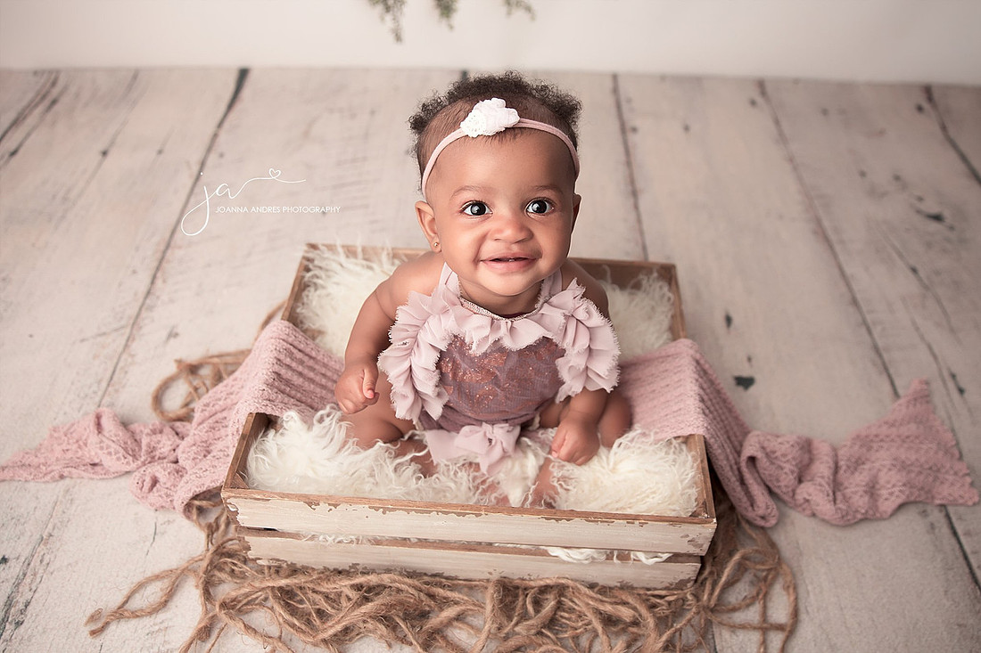 Baby looking up smiling