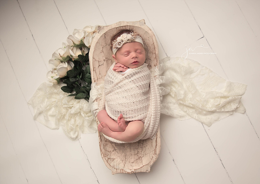 Baby Girl in Basket with roses in whites