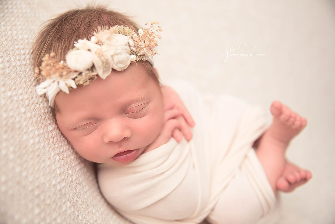 Baby Girl wrapped in neutrals