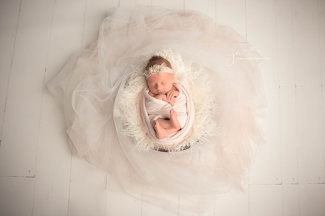 Baby wrapped in Prop with Wedding Veil wrapped around