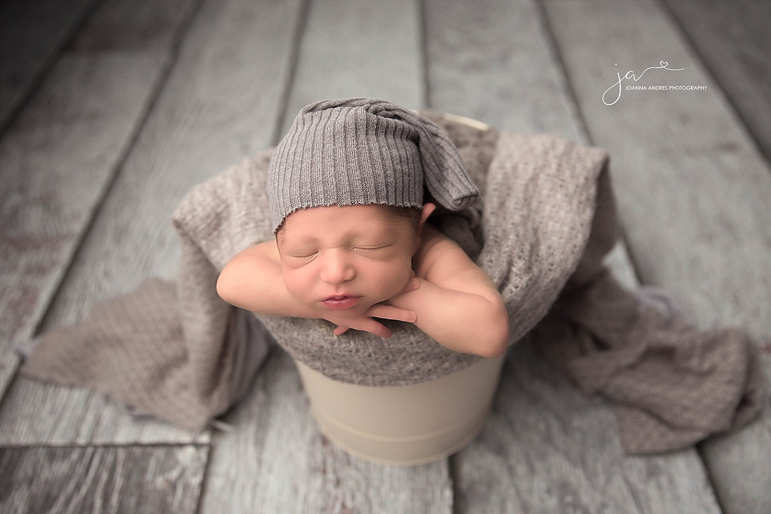 Baby in a Bucket with a hat